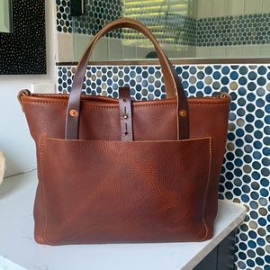 Small Avery tote with large front pocket by Go Forth Goods in the color saddle
